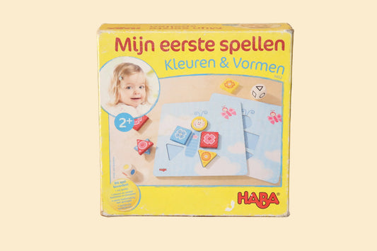 Voorkant van de HABA Kleuren & Vormen speldoos uit de serie Mijn eerste spellen vanaf 2 jaar